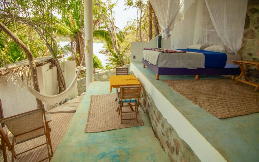 Room 2 open-air ocean queen with hammock, queen bed, and ocean view